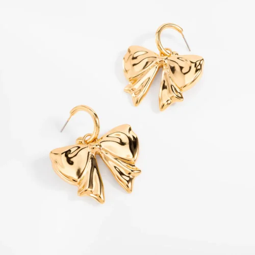 Arete con diseño de moño